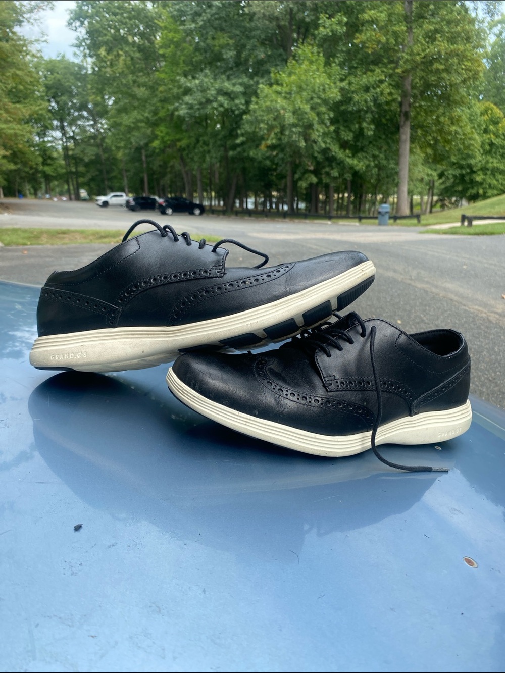 Cole Haan Black Leather Wingtip Slip-On Sneakers with White Soles